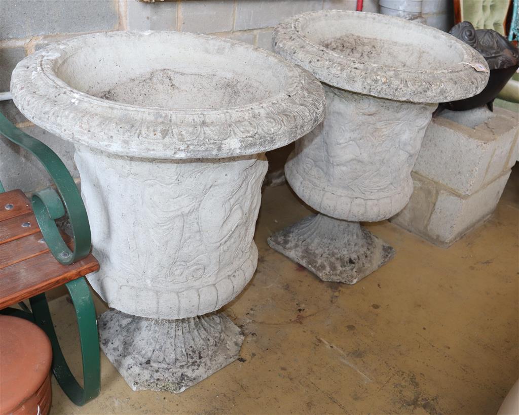 A pair of reconstituted stone Campana garden urns, 62cm diameter, H.80cm